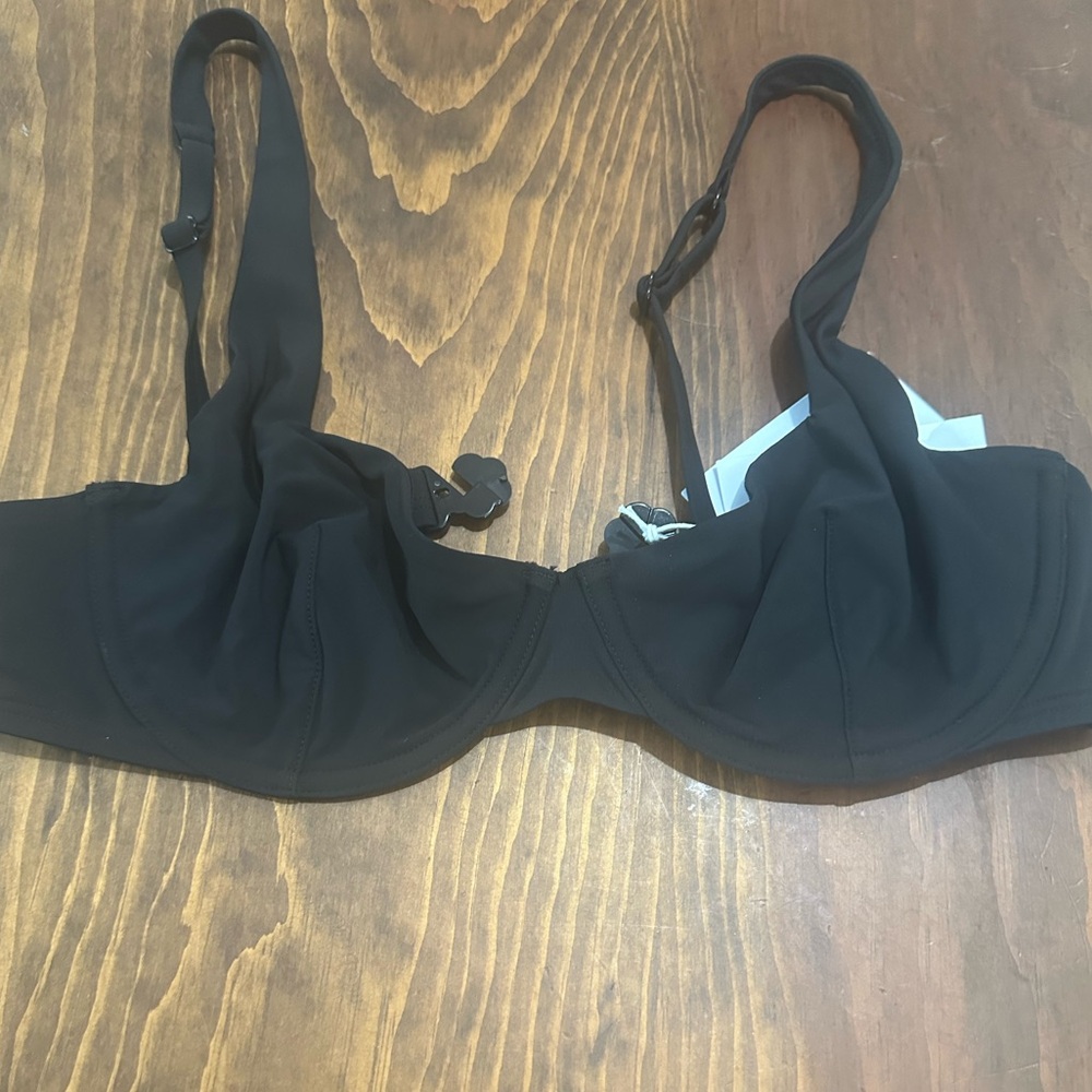 Bra like Bikini top. Low cut.